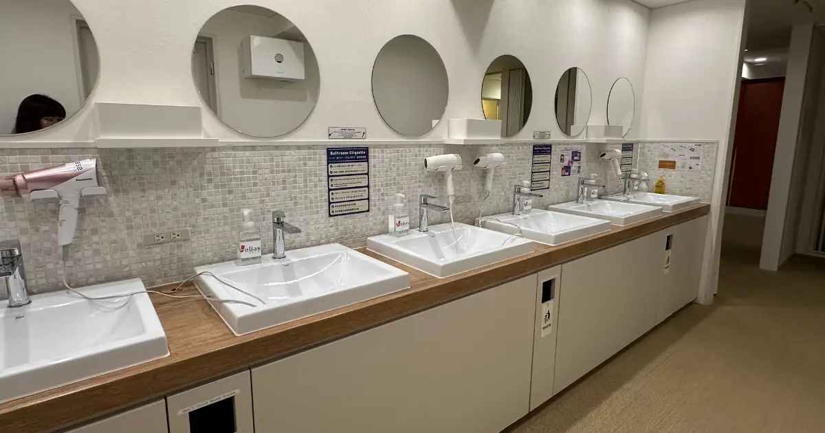 Commercial facility bathroom after a cleaning by Maid to Shine