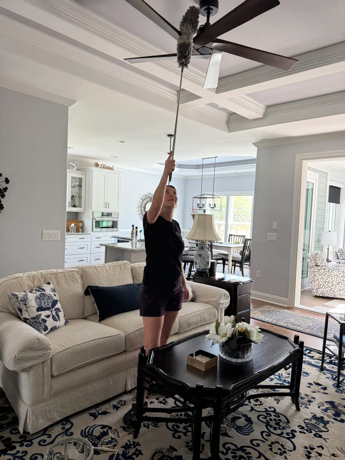 Ceiling fan being cleaned during a detailed cleaning service by Maid to Shine